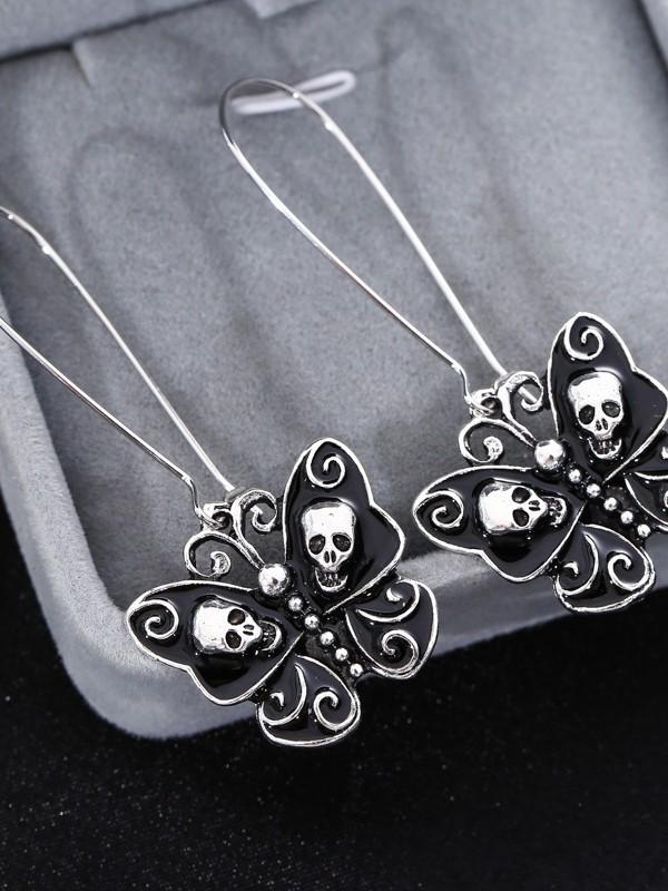 Vintage oil drop skull bow earrings