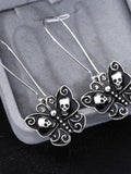 Vintage oil drop skull bow earrings